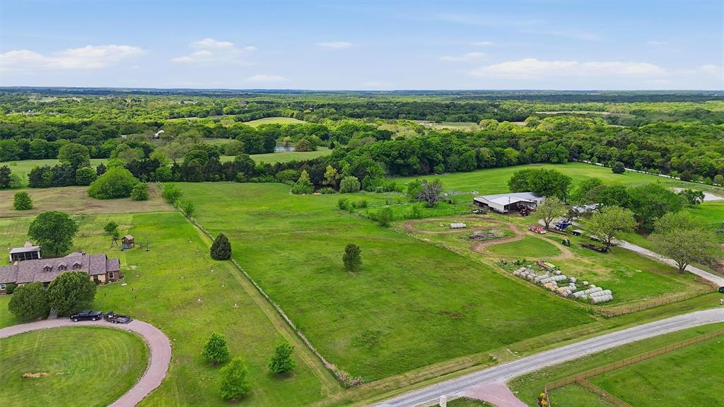 155 Basin Springs Road Sadler, TX 76264 - Photo 3 of 20 a view of a golf course with a big yard