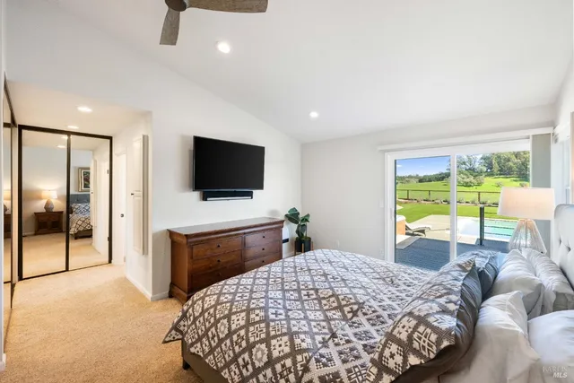 a bathroom with a granite countertop tub sink double vanity granite tub shower and mirror