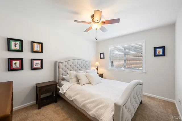 a bedroom with furniture and a bed