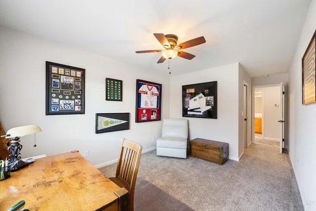 a view of a patio with a table chairs and a patio