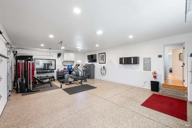 an outdoor space with pool and furniture