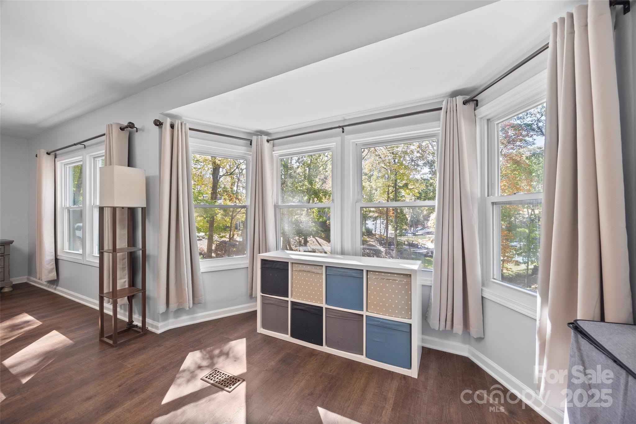 26003 Morningside Drive Fort Mill, SC 29708 - Photo 16 of 37 a view of wooden floor and windows in a room