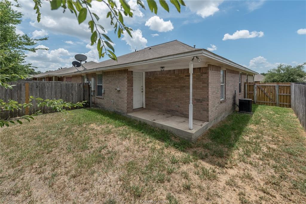 1715 Rock Hollow Loop Bryan, TX 77807 - Photo 13 of 13 a view of a backyard