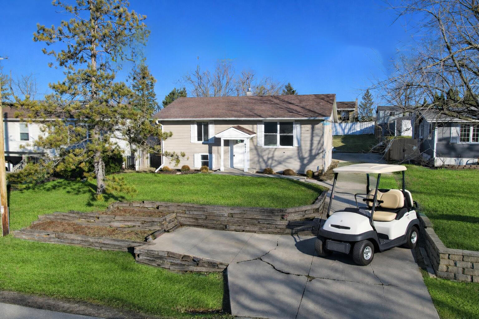 Golf cart not included. The photo is virtually staged.