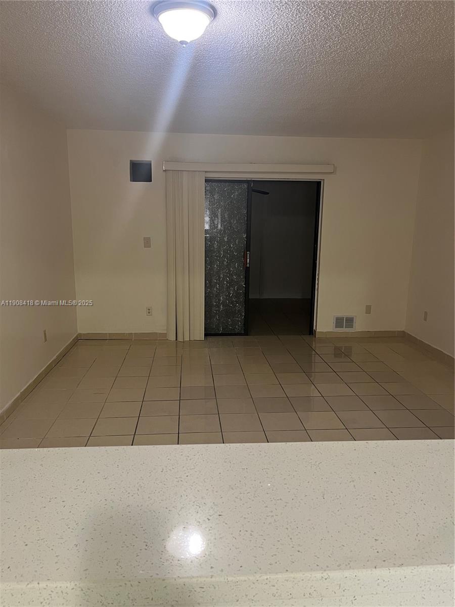 2255 West 55th Street, Unit 2 Hialeah, FL 33016 - Photo 4 of 13 a view of an empty room