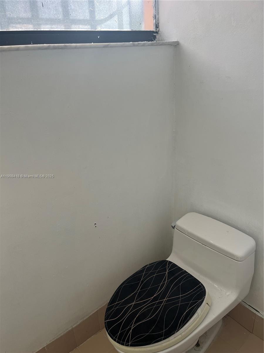 2255 West 55th Street, Unit 2 Hialeah, FL 33016 - Photo 8 of 13 a bathroom with a toilet