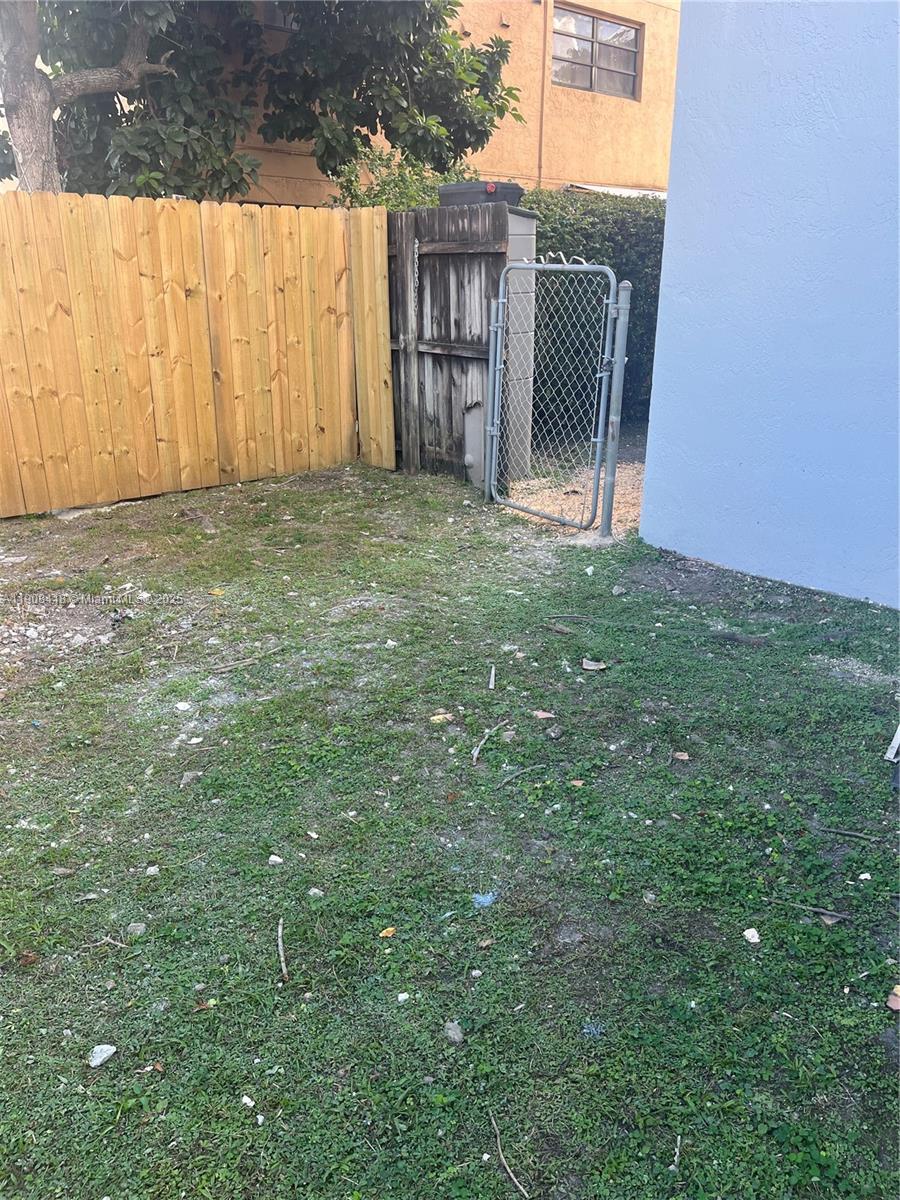 2255 West 55th Street, Unit 2 Hialeah, FL 33016 - Photo 9 of 13 a view of an outdoor space and a window