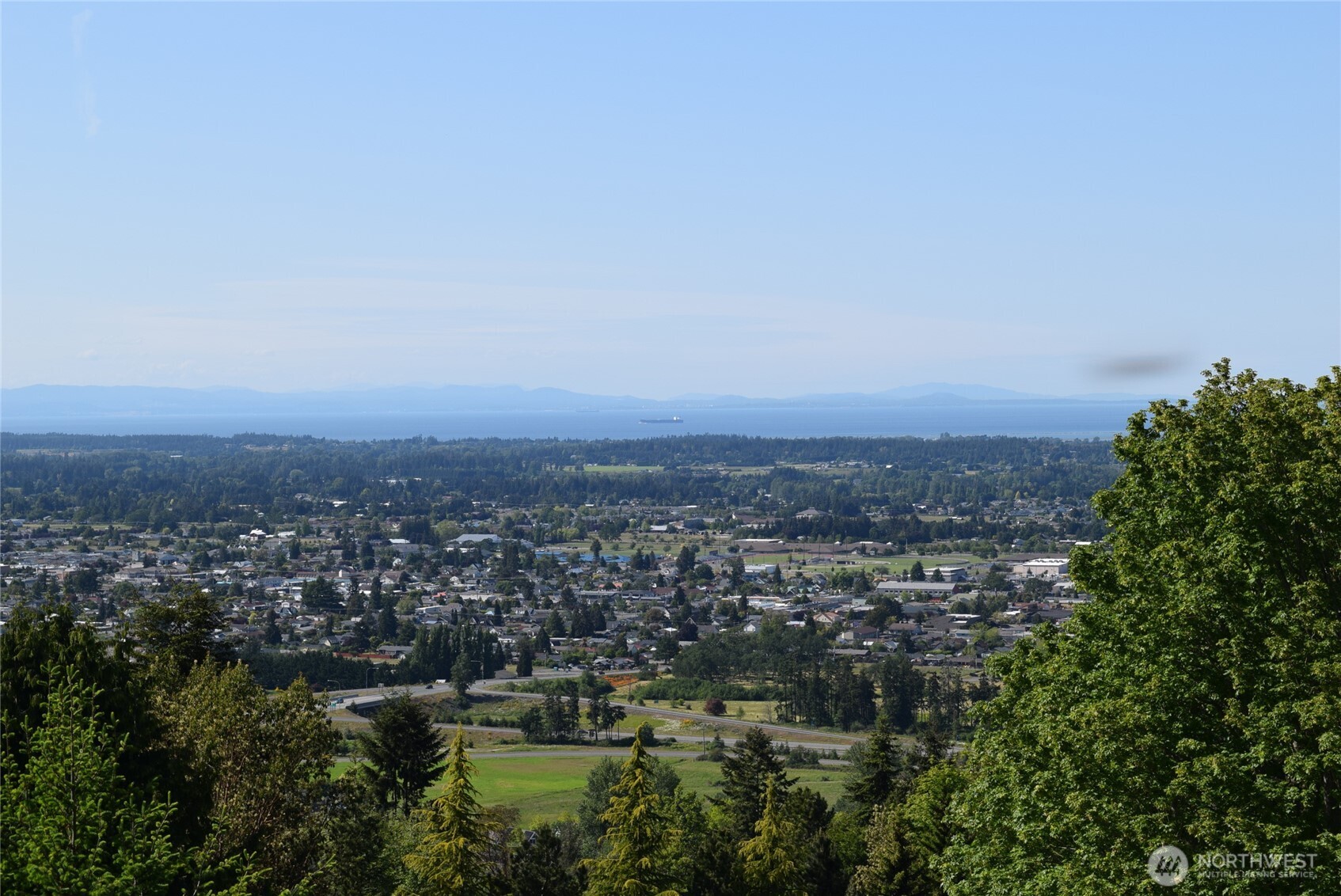 603 Owls Nest Road Sequim, WA 98382 - Photo 15 of 32 an aerial view of residential house and trees around