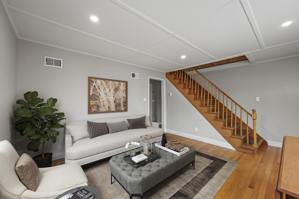 227 Protection North Adams, MA 01247 - Photo 13 of 25 a living room with furniture and a potted plant