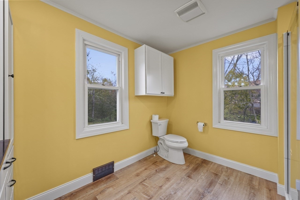 227 Protection North Adams, MA 01247 - Photo 15 of 25 a bathroom with a toilet sink and mirror