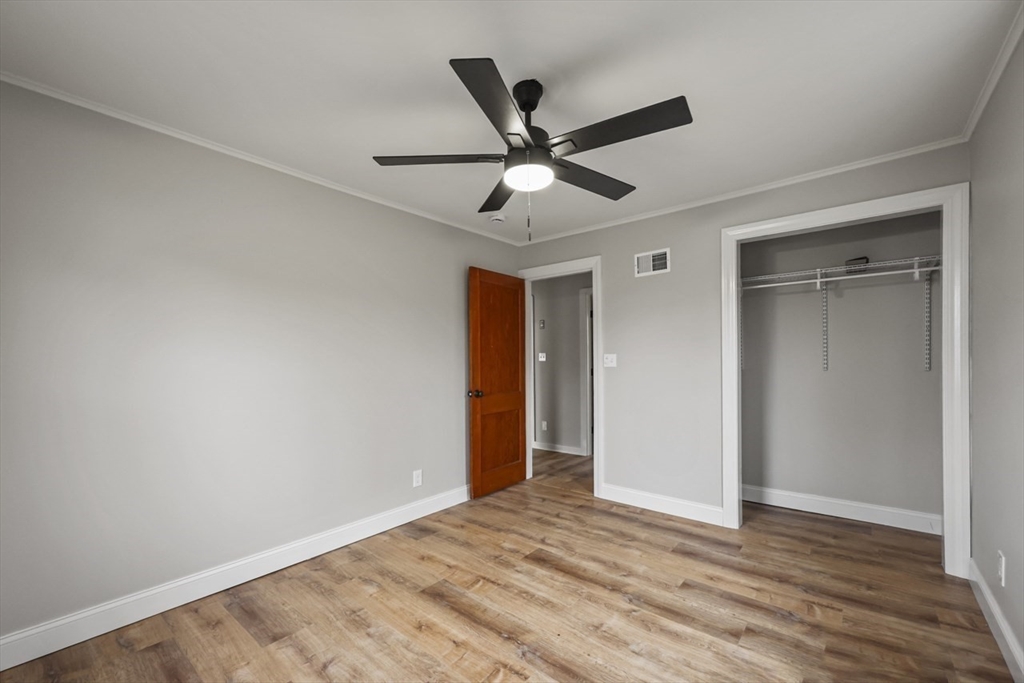 227 Protection North Adams, MA 01247 - Photo 18 of 25 a view of empty room with wooden floor