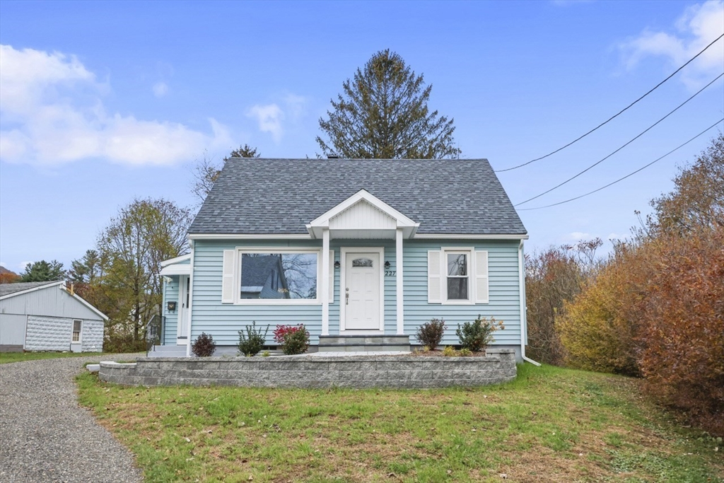 227 Protection North Adams, MA 01247 - Photo 5 of 25 a view of a house with a patio and a yard
