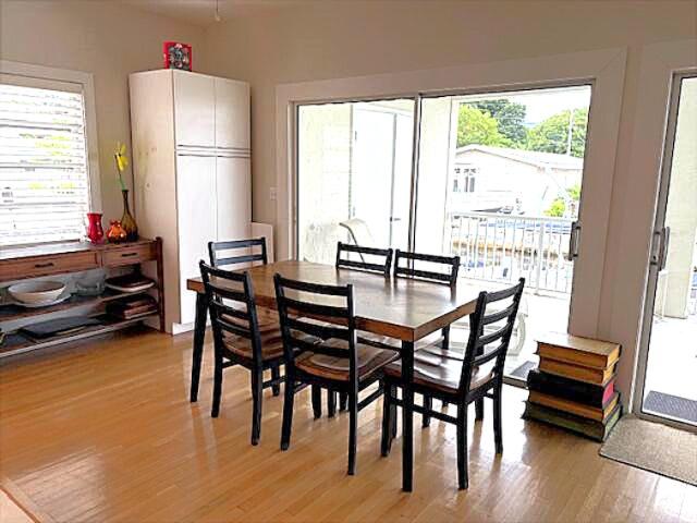 314 Loeb Avenue Key Largo, FL 33037 - Photo 13 of 28 a dining room with furniture and wooden floor