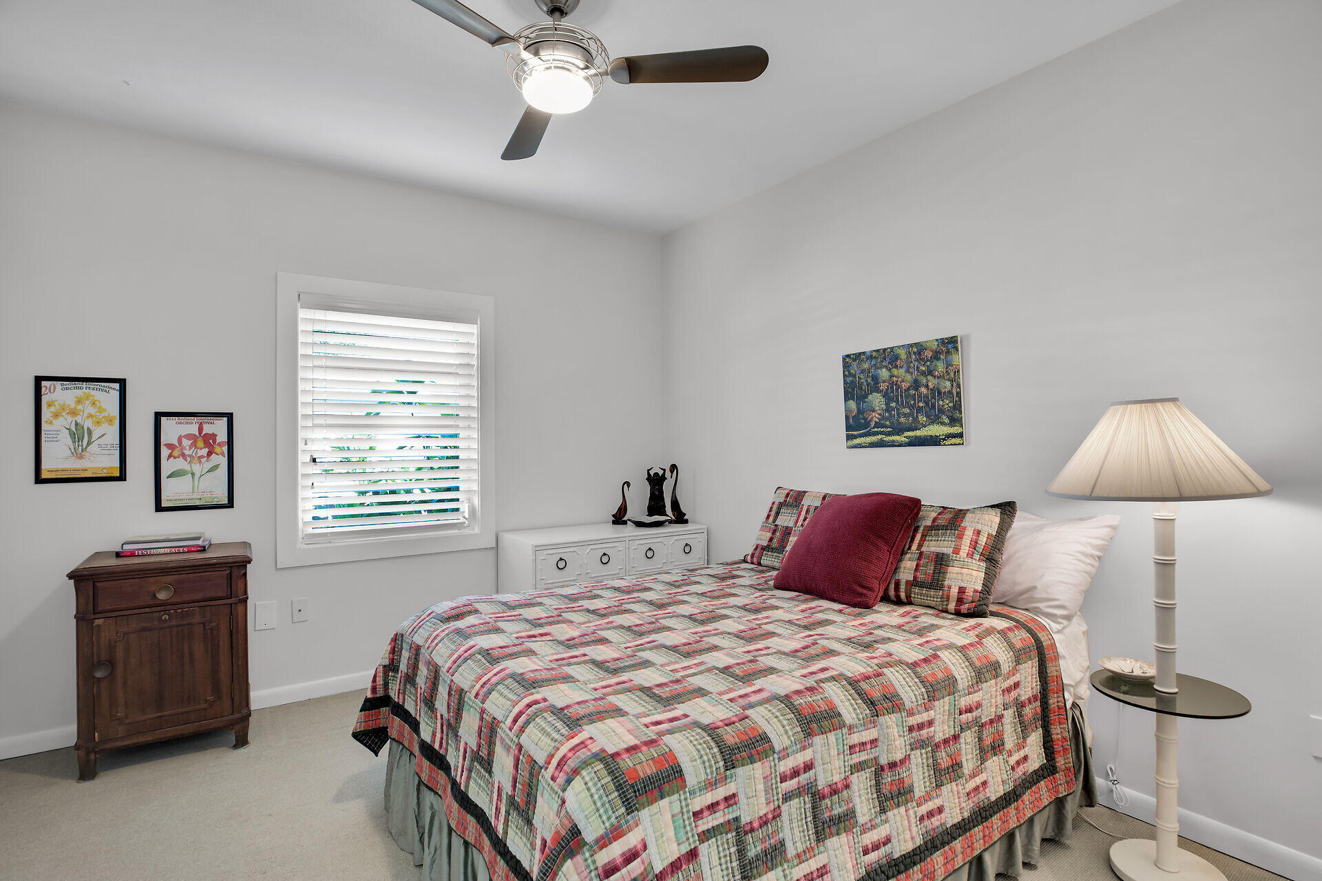 314 Loeb Avenue Key Largo, FL 33037 - Photo 17 of 28 a bedroom with a bed and a lamp