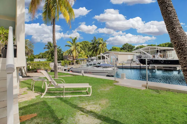 a view of a house with a big yard