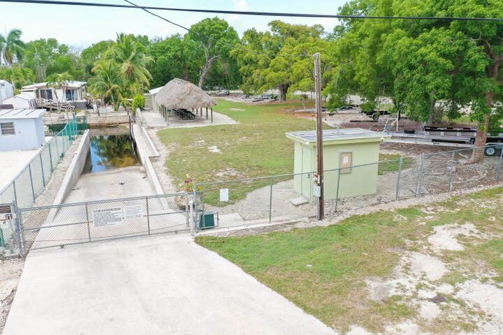 314 Loeb Avenue Key Largo, FL 33037 - Photo 27 of 28 a view of a swimming pool with a patio