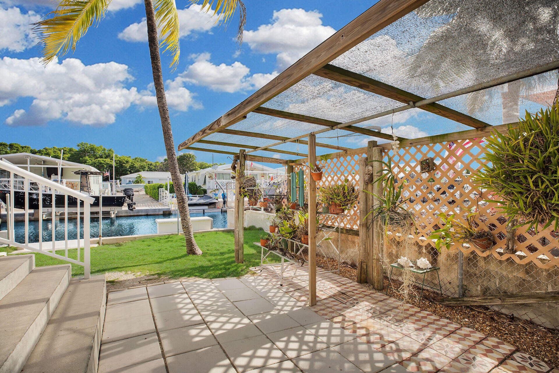314 Loeb Avenue Key Largo, FL 33037 - Photo 3 of 28 a view of a pathway with a backyard