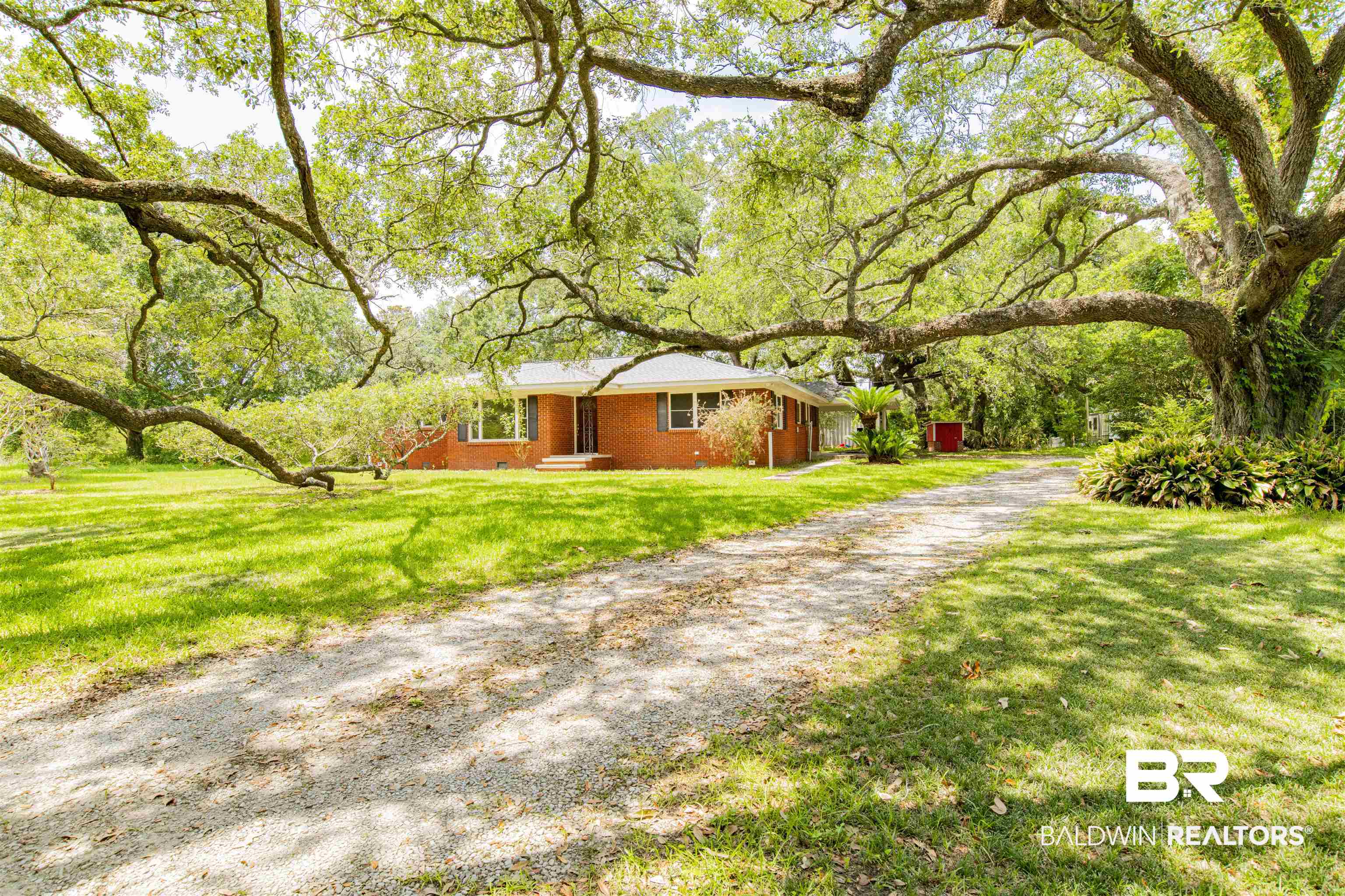 18347 Underwood Road Foley, AL 36535 - Photo 23 of 40 View of green lawn with driveway