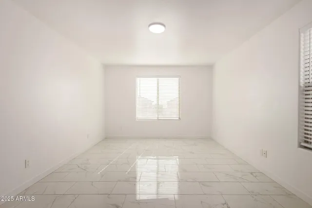 an empty room with entrance and entrance