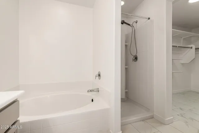 a view of an empty walk in closet