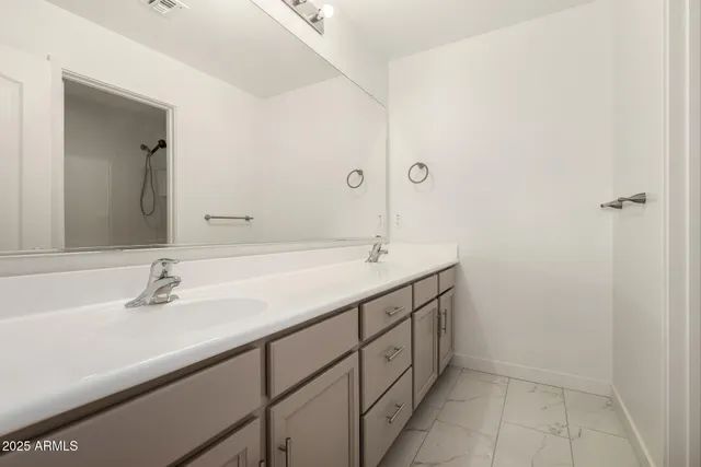 a bathroom with a toilet and a bathtub