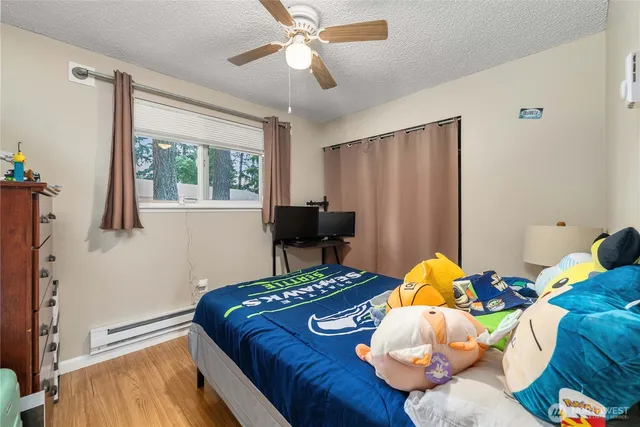 a kitchen with cabinets appliances a sink and a counter top