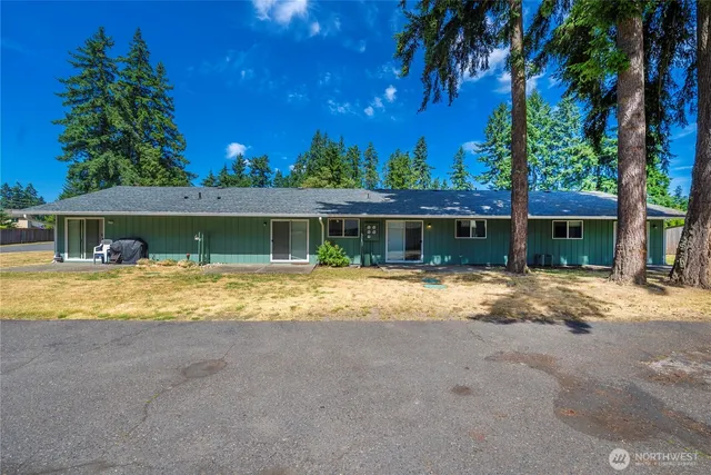 swimming pool view with a seating space