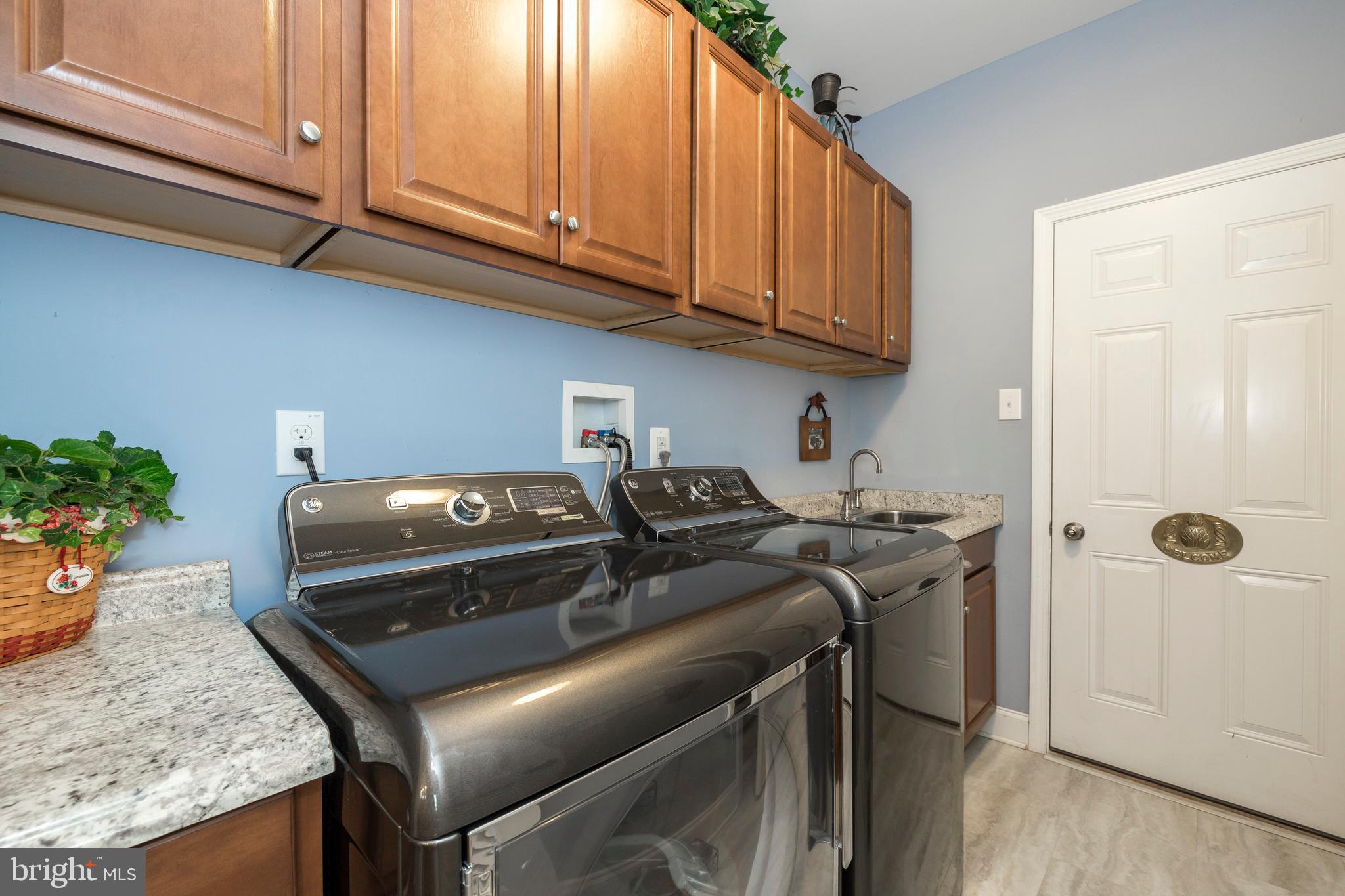 213 Pinkerton Road Coatesville, PA 19320 - Photo 23 of 39 Laundry room with cabinetry and new utility sink.