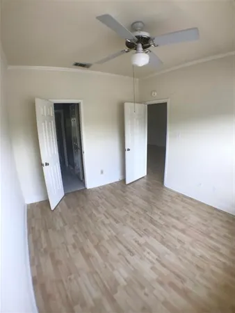 a bathroom with a sink a toilet and a shower