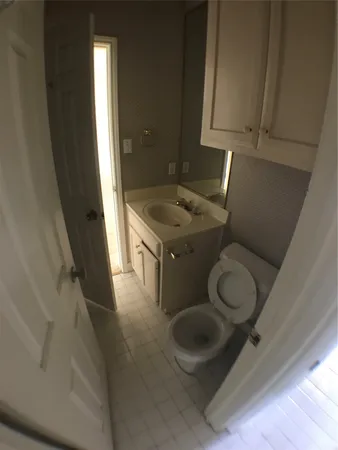 a bathroom with a tub and shower