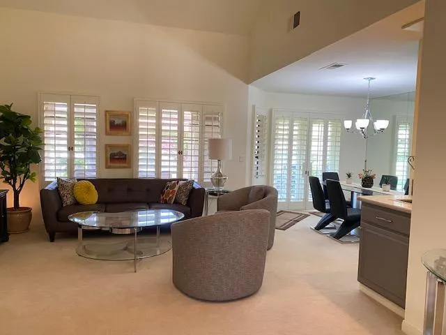 a view of a golf course with a lake view