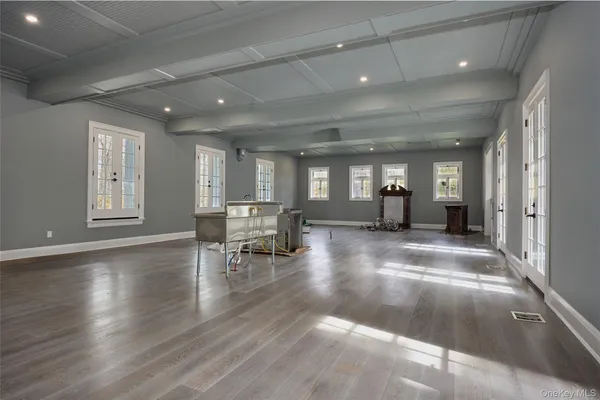 a view of a lobby with furniture and floor to ceiling window