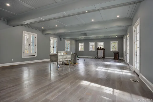 a view of a lobby with furniture and floor to ceiling window