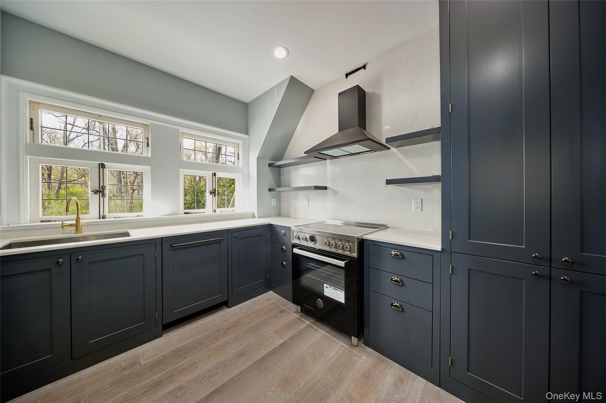 76 Summit Road Tuxedo Park, NY 10987 - Photo 23 of 37 a kitchen with stainless steel appliances granite countertop a sink stove and refrigerator