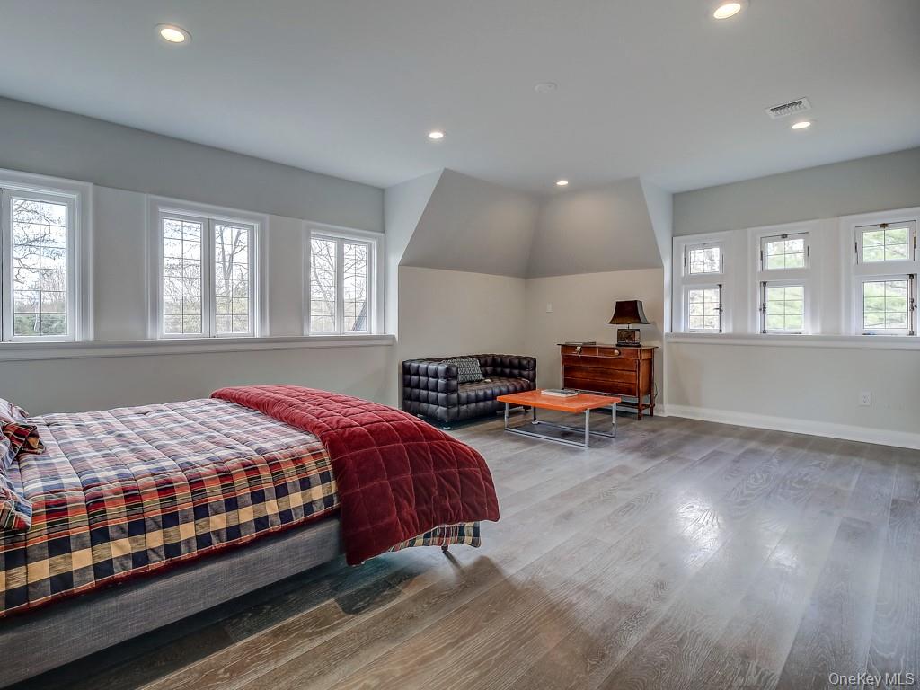 76 Summit Road Tuxedo Park, NY 10987 - Photo 32 of 37 a bedroom with a bed a table and window
