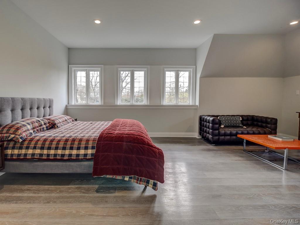 76 Summit Road Tuxedo Park, NY 10987 - Photo 33 of 37 a spacious bedroom with a bed and a couch