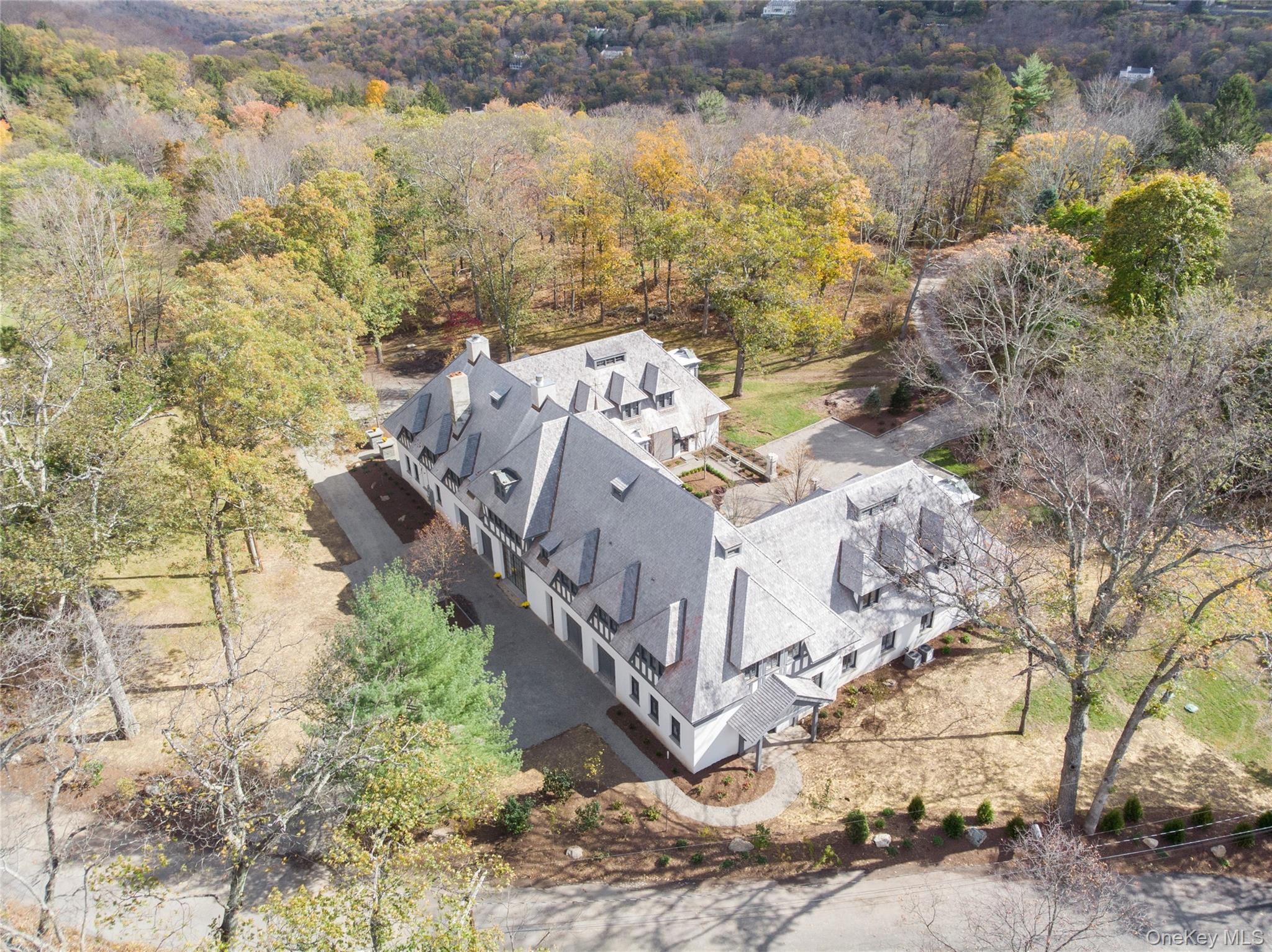 76 Summit Road Tuxedo Park, NY 10987 - Photo 4 of 37 a view of a houses with a yard
