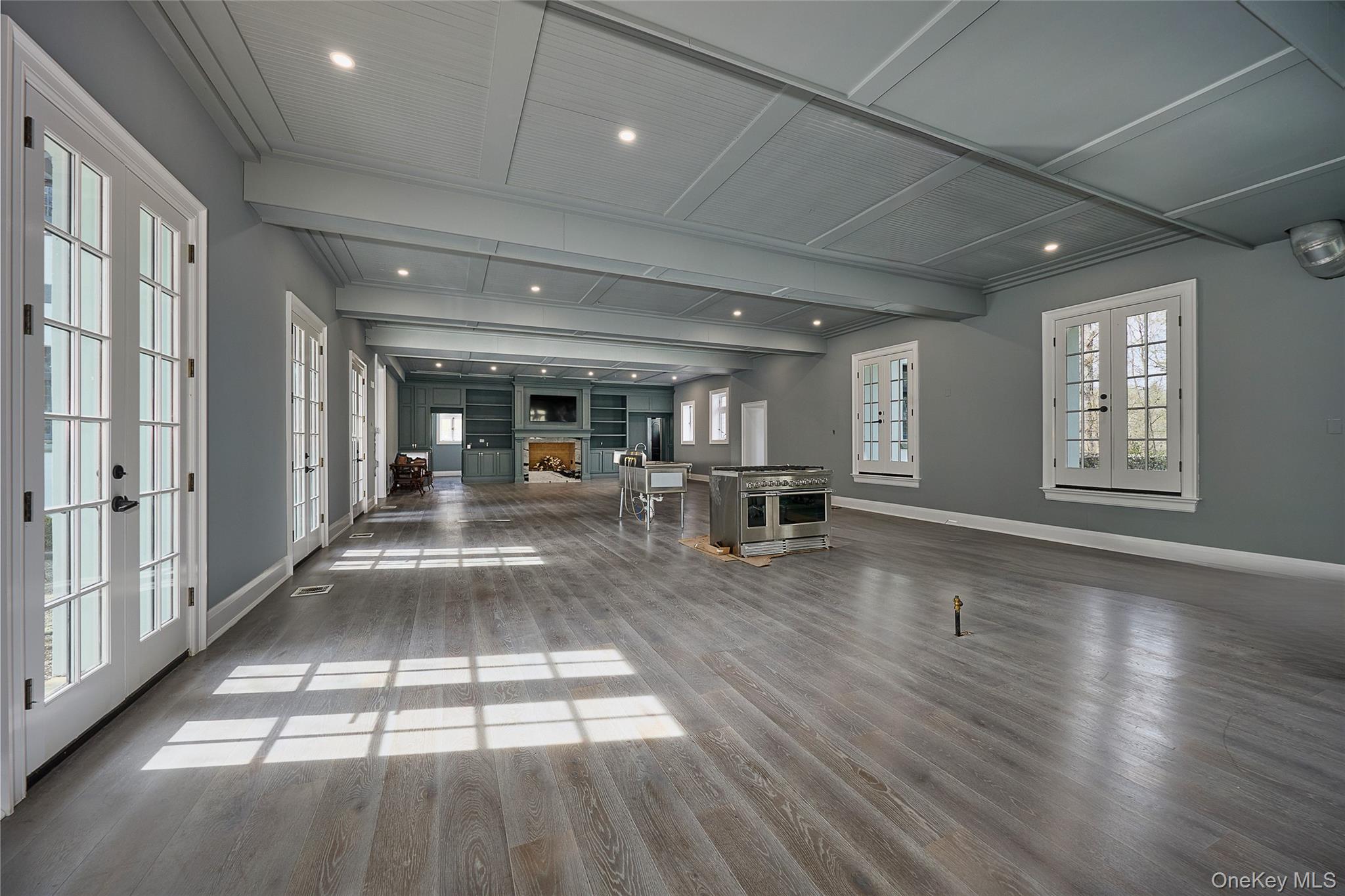 76 Summit Road Tuxedo Park, NY 10987 - Photo 9 of 37 a lobby with furniture and floor to ceiling window