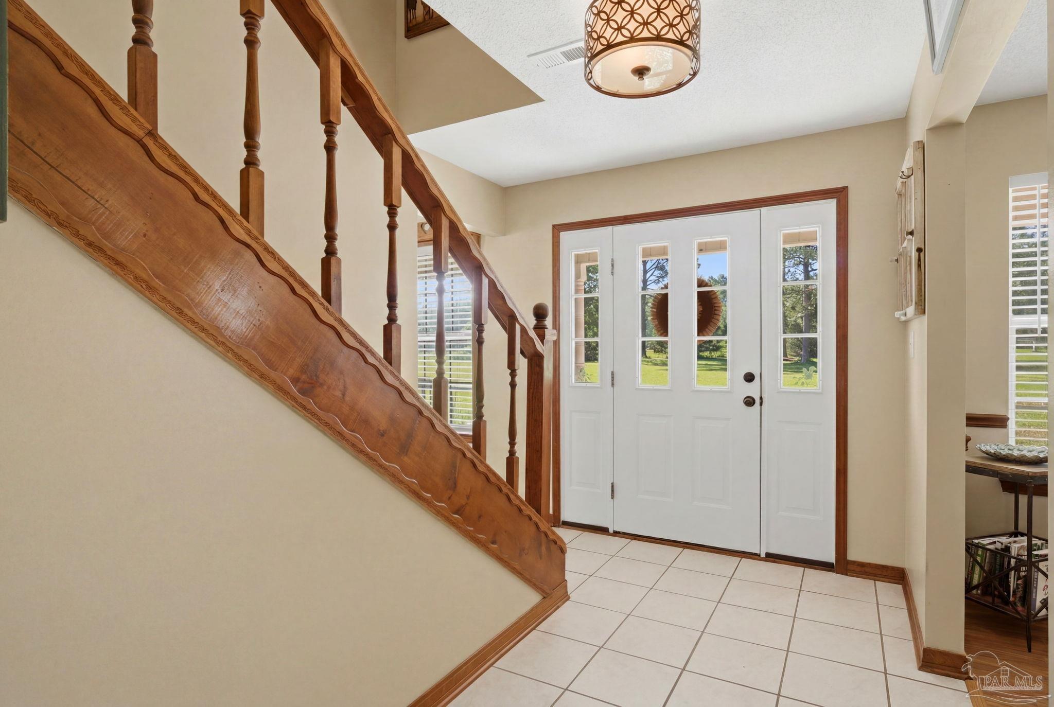 6870 Martin Road Milton, FL 32570 - Photo 5 of 48 a view of an entryway with workspace