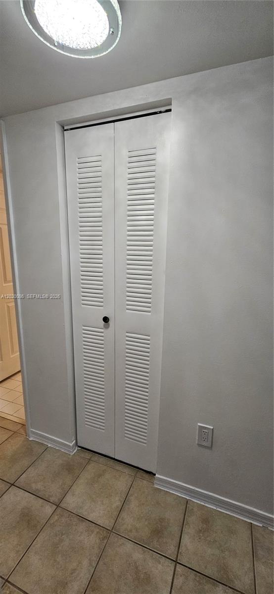 3830 Lyons Road, Unit 3013 Coconut Creek, FL 33073 - Photo 18 of 23 Hallway linen closet