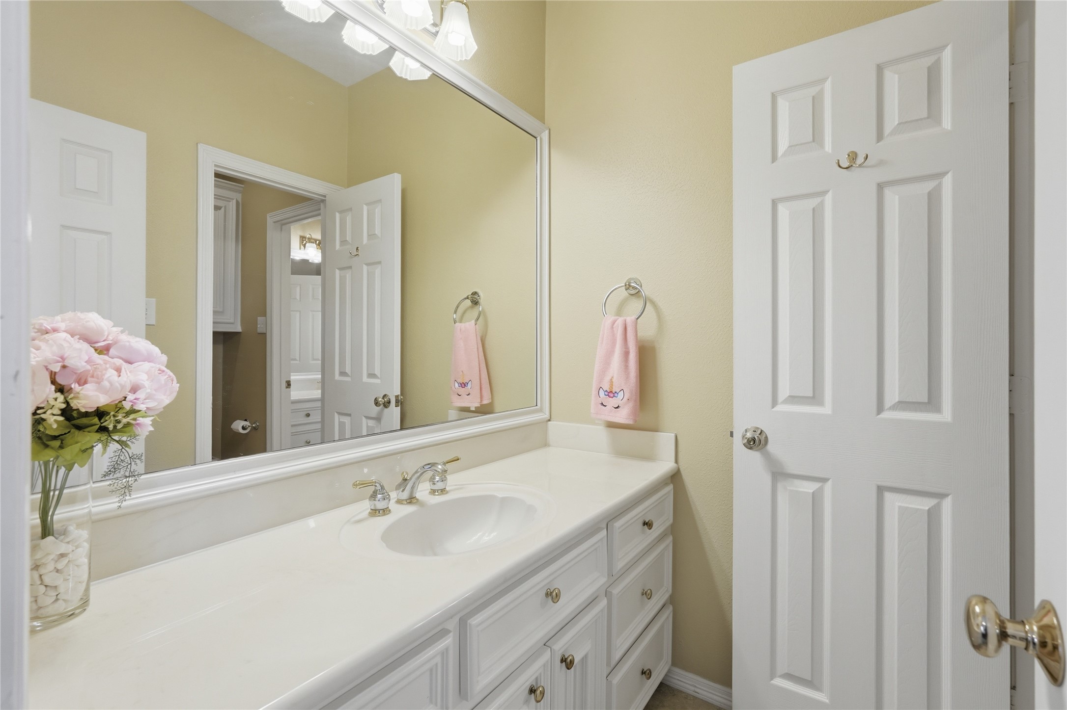 55 Monterrey Road East Montgomery, TX 77356 - Photo 37 of 50 Bright bathroom with a large mirror, white vanity, and ample storage.