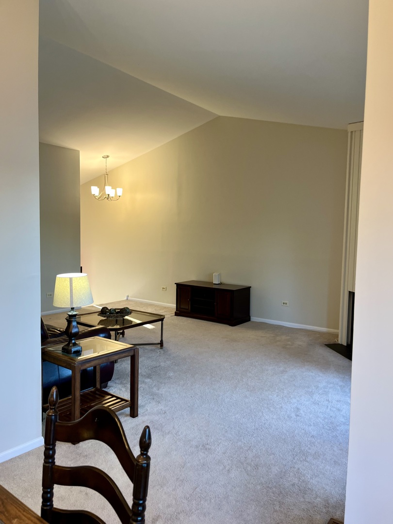 33 Shoreline Road, Unit B Lake Barrington, IL 60010 - Photo 11 of 49 a workspace with furniture and a lamp