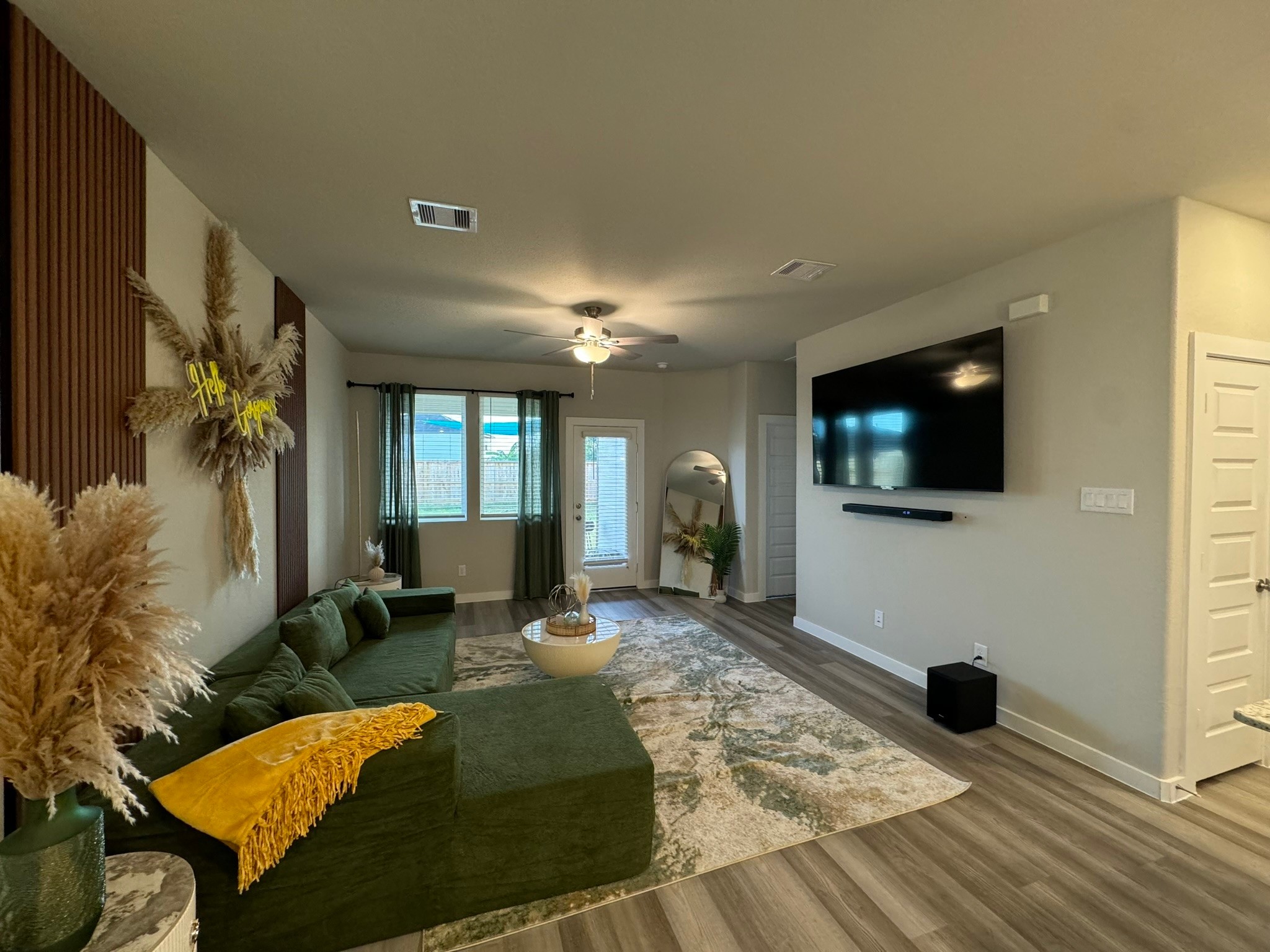 5608 Madden Lane Houston, TX 77048 - Photo 1 of 29 a living room with furniture and a flat screen tv