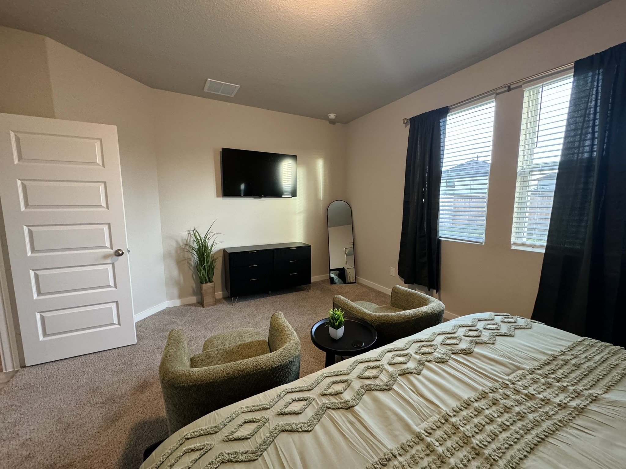 5608 Madden Lane Houston, TX 77048 - Photo 12 of 29 a bedroom with two beds and a fireplace