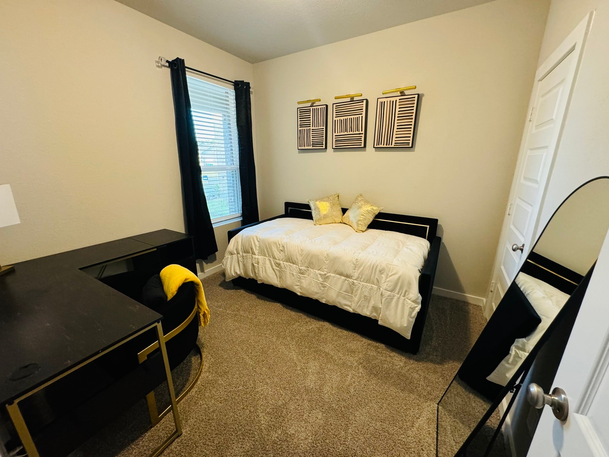 5608 Madden Lane Houston, TX 77048 - Photo 20 of 29 a bedroom with a bed and furniture