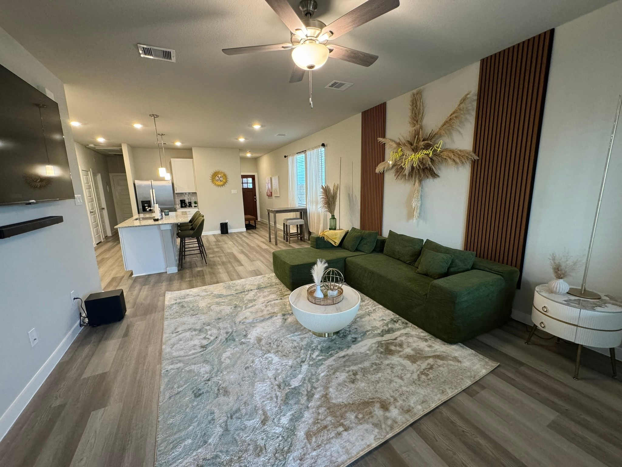 5608 Madden Lane Houston, TX 77048 - Photo 2 of 29 a living room with furniture and a chandelier