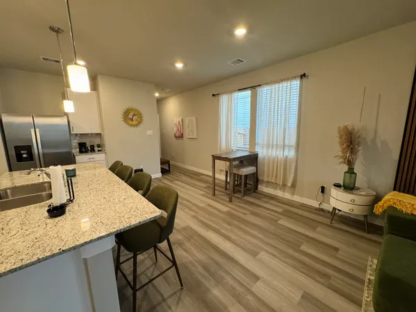 a view of a dining room with furniture
