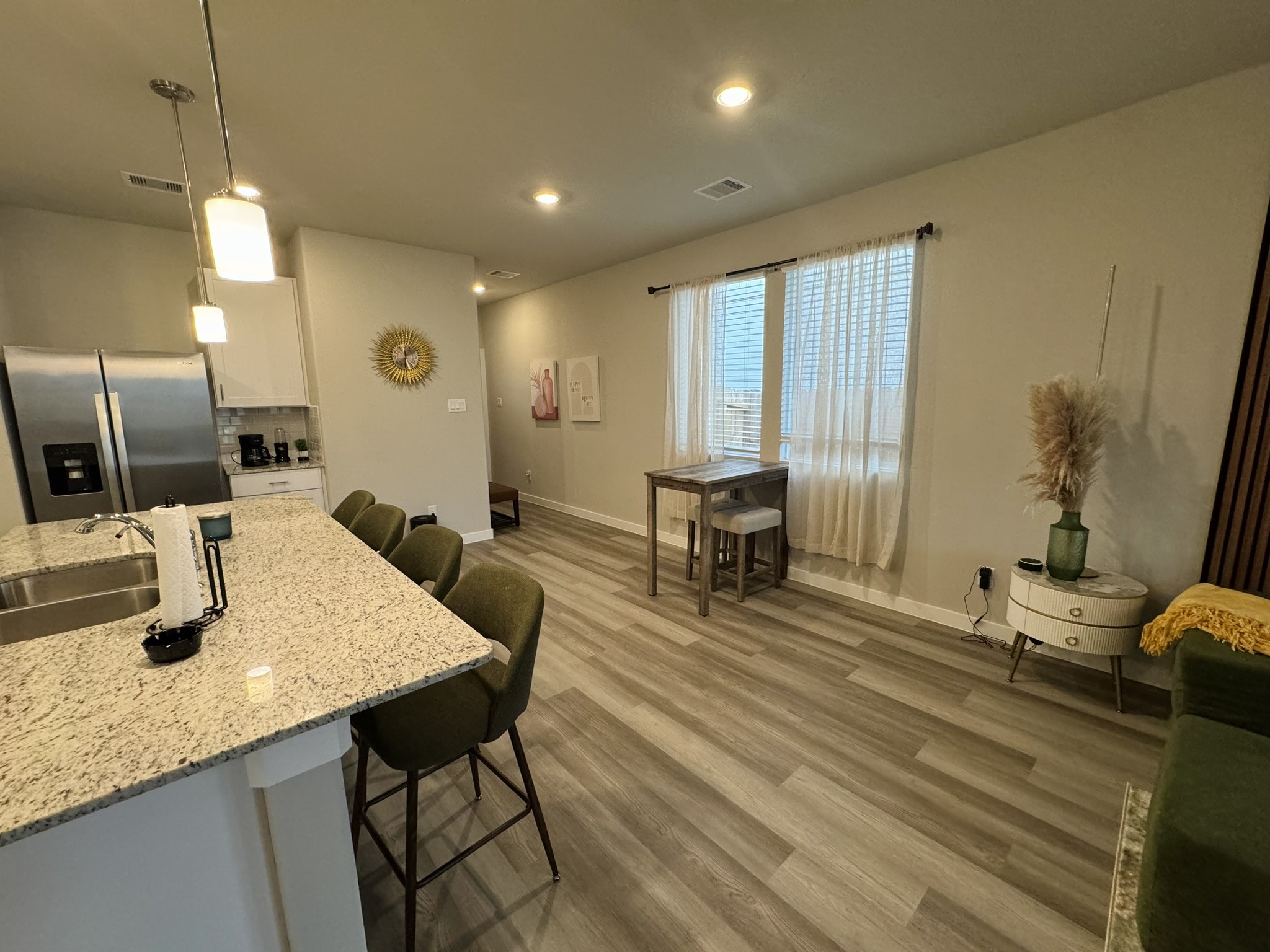 5608 Madden Lane Houston, TX 77048 - Photo 9 of 29 a kitchen with sink and view of living room