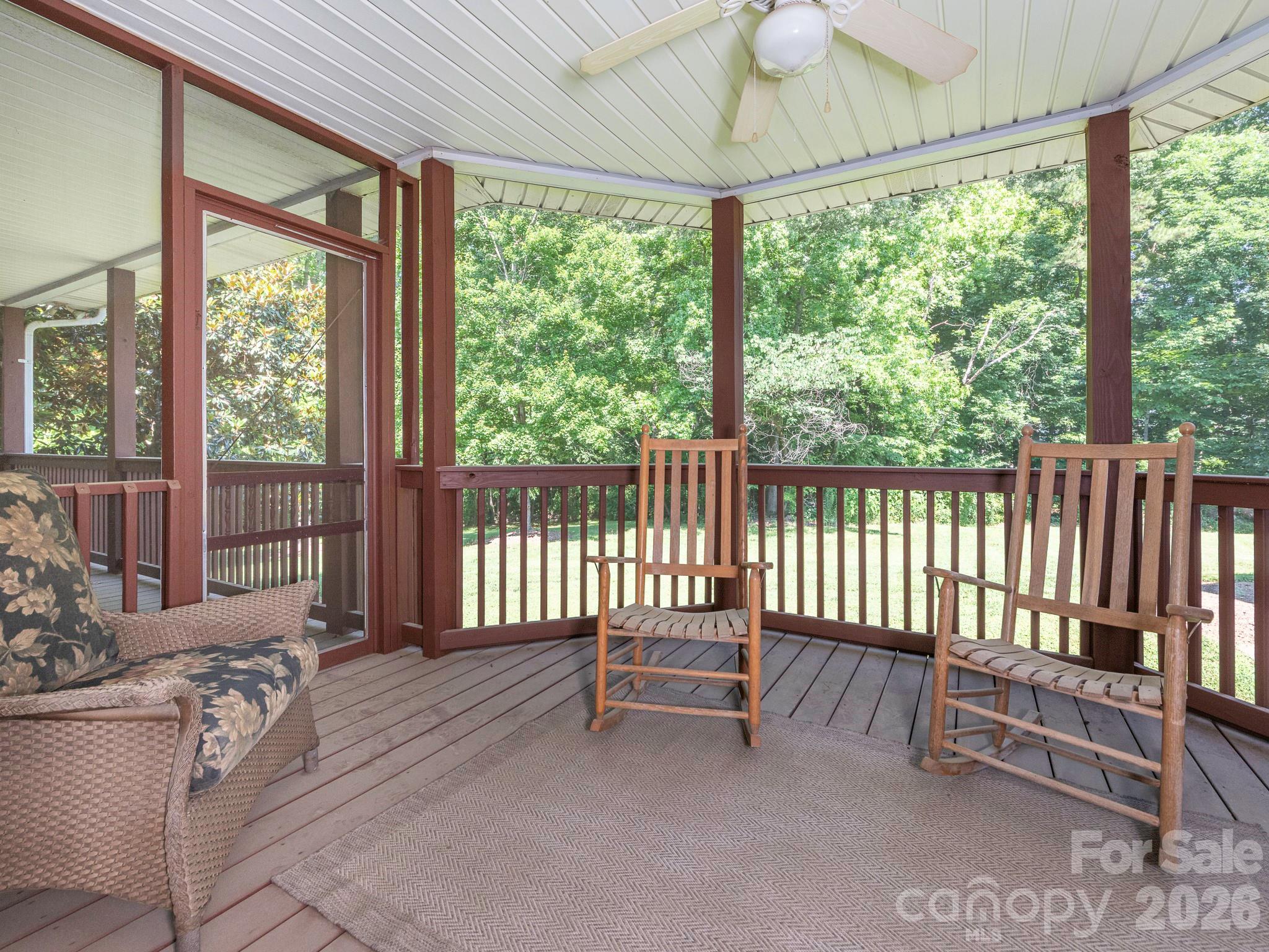 4440 Hucks Road Charlotte, NC 28269 - Photo 40 of 45 a view of a porch with furniture and backyard