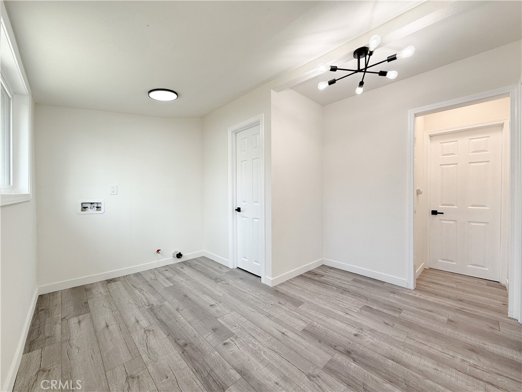 521 West Cherry Street Compton, CA 90222 - Photo 12 of 20 wooden floor in an empty room